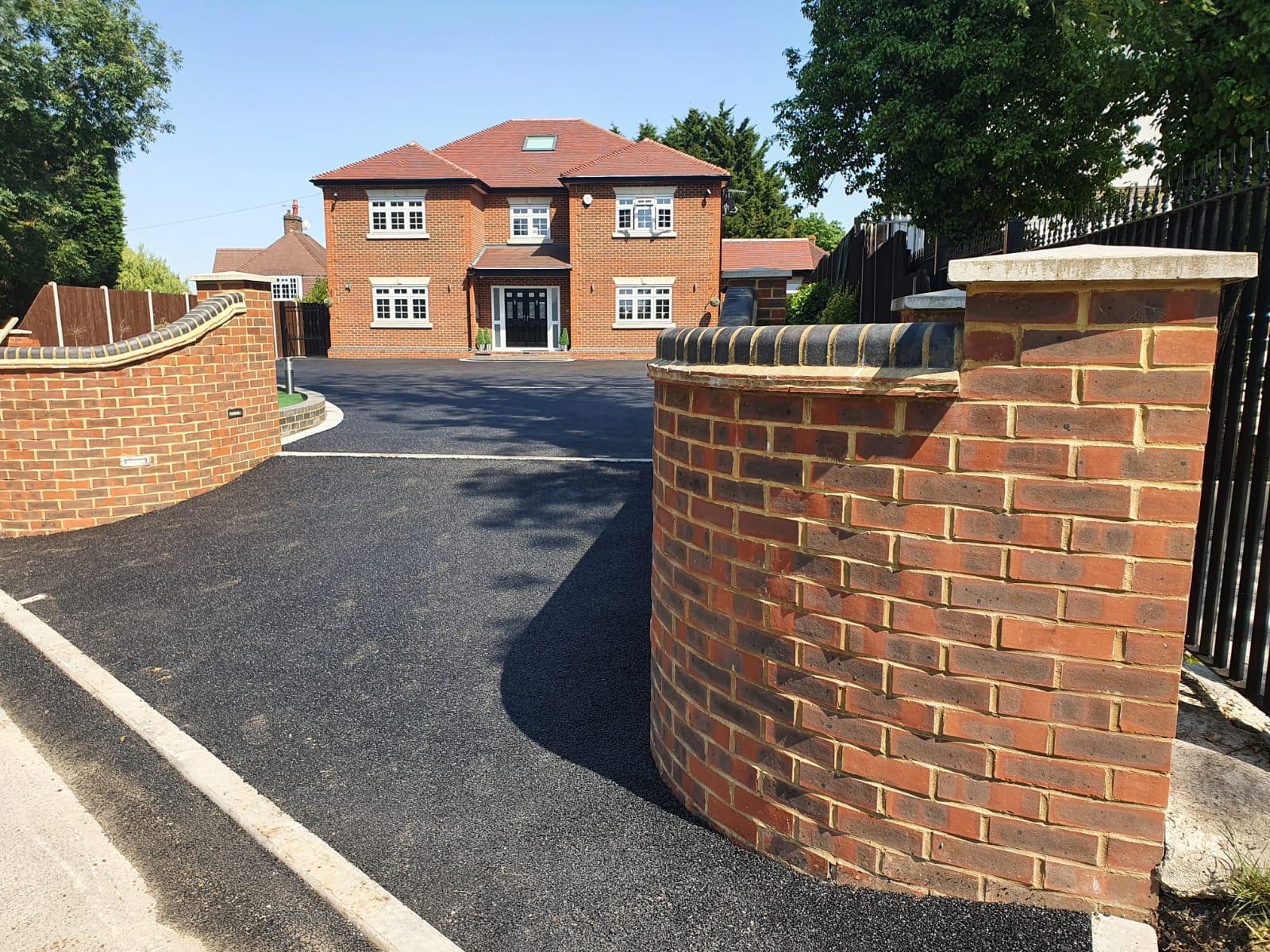 Wrap around porcelain patio and driveway works