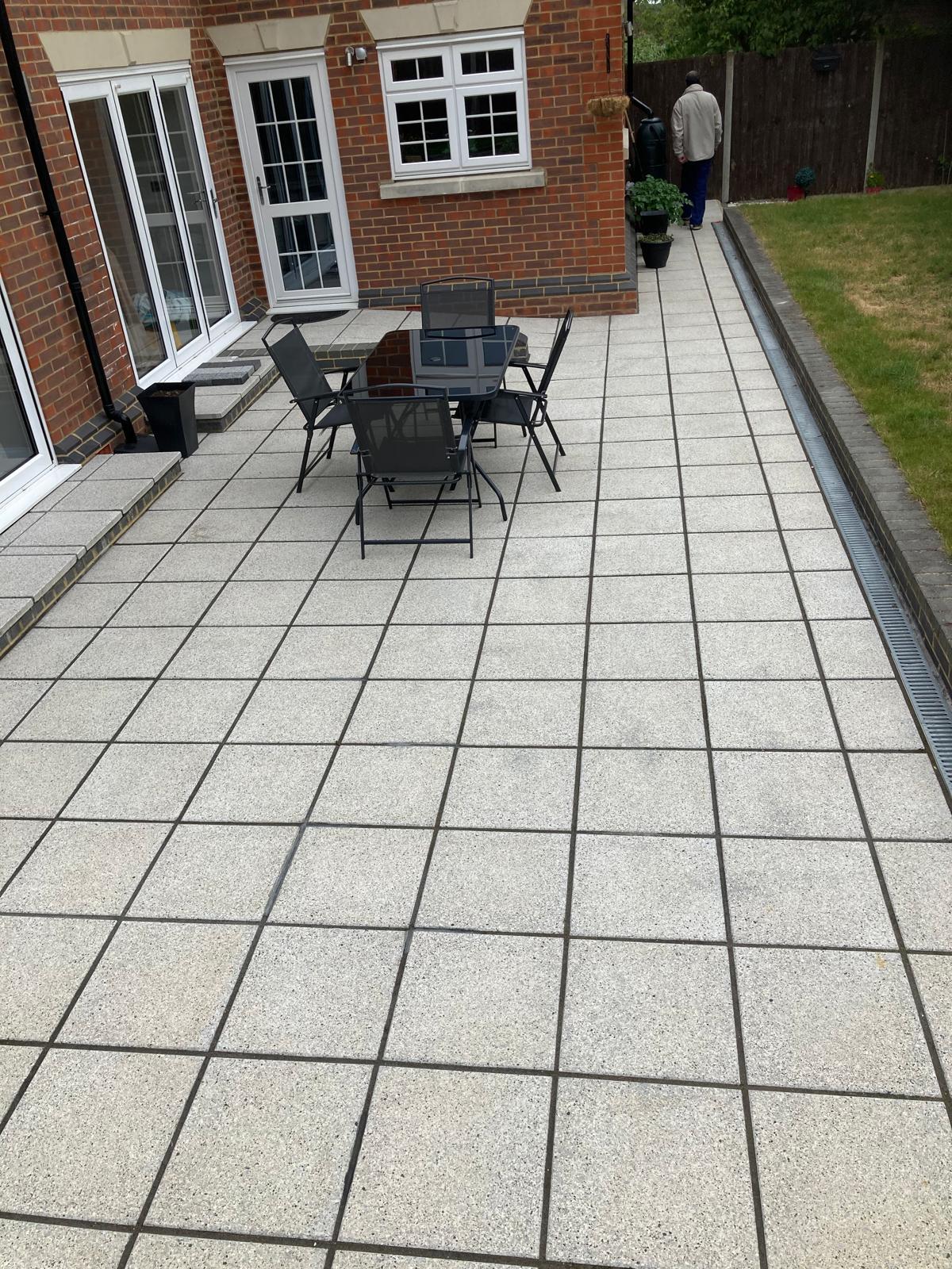 Wrap around porcelain patio and driveway works